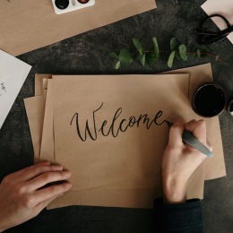 a person writing on paper