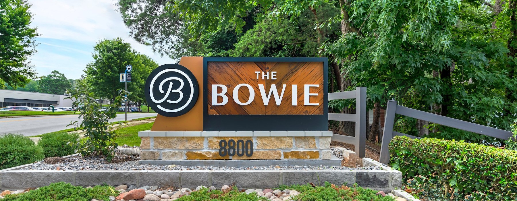 a sign in a park