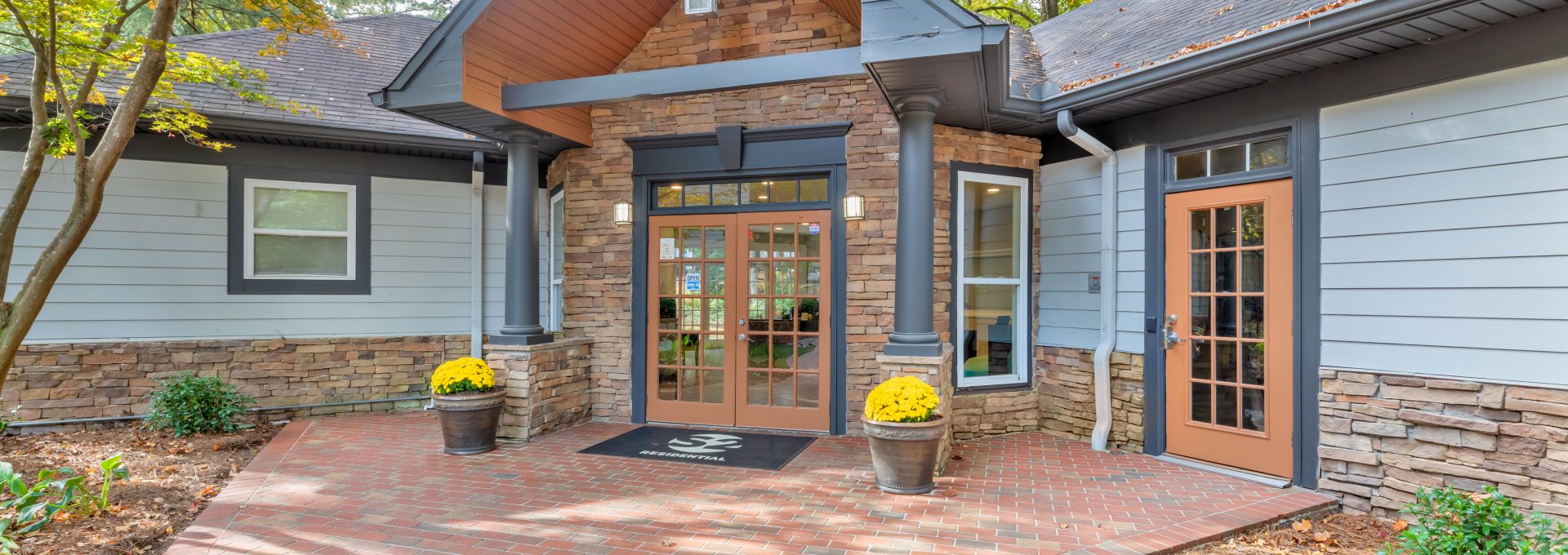 the front entrance to a home with brick walkway at The  Bowie